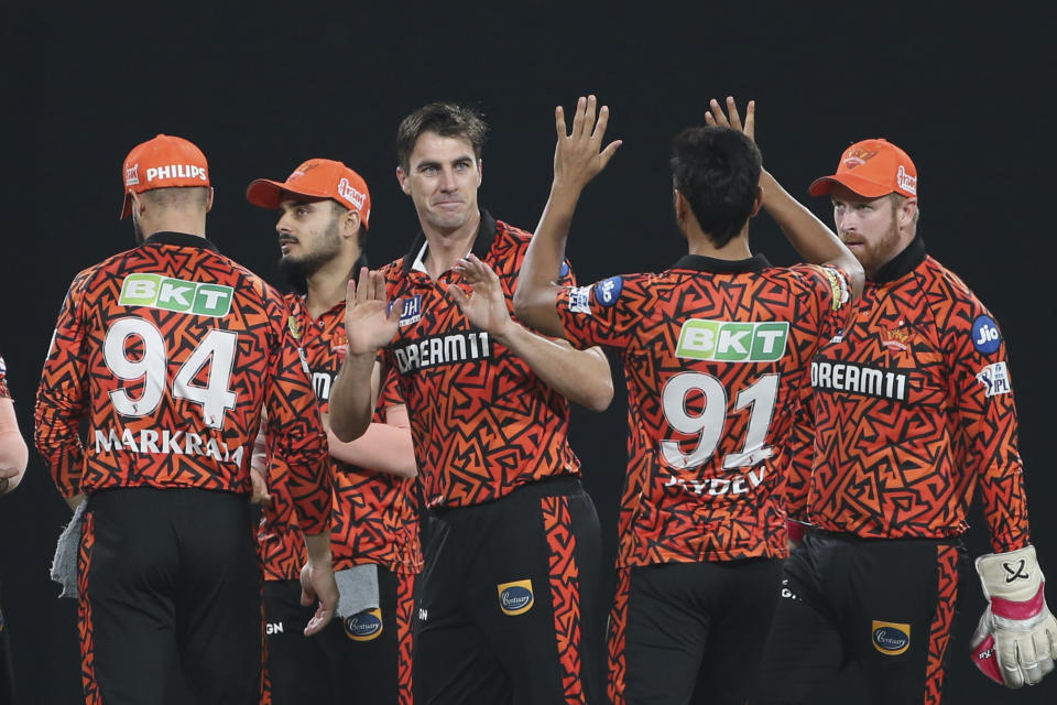 Sunrisers Hyderabad's captain Pat Cummins , centre, celebrates the dismissal of Punjab Kings' Jonny Bairstow during the Indian Premier League cricket match between Sunrisers Hyderabad's and Punjab Kings in Mohali, India, Tuesday, April . 9, 2024.(AP Photo/Surjeet Yadav)