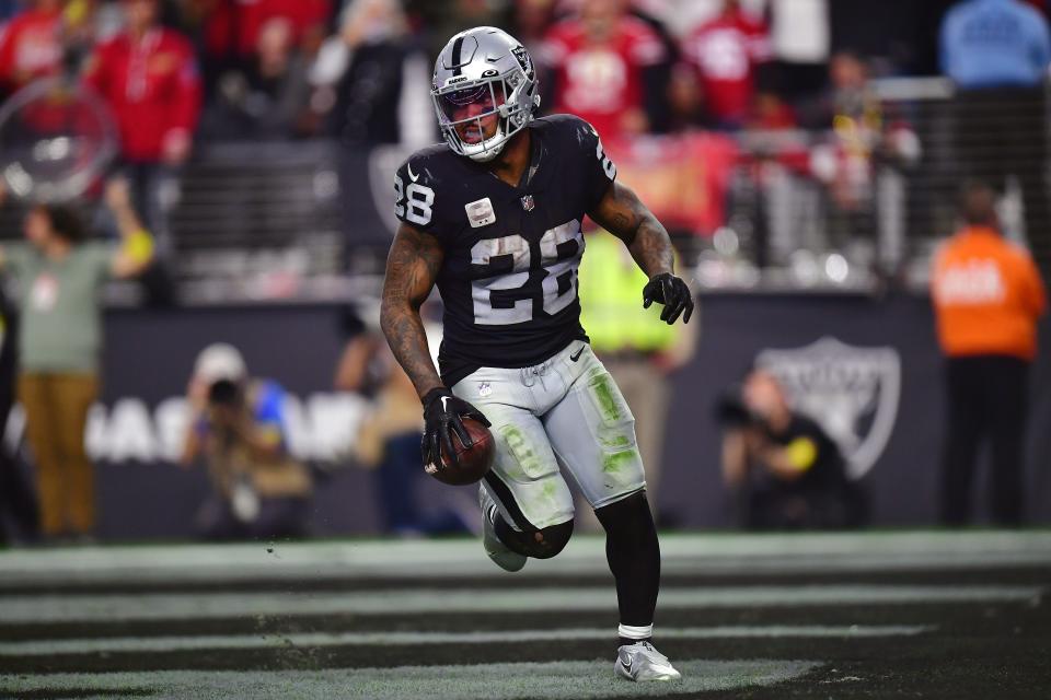 Raiders running back Josh Jacobs has a league-leading 1,608 rushing yards and is third at the position in fantasy points.