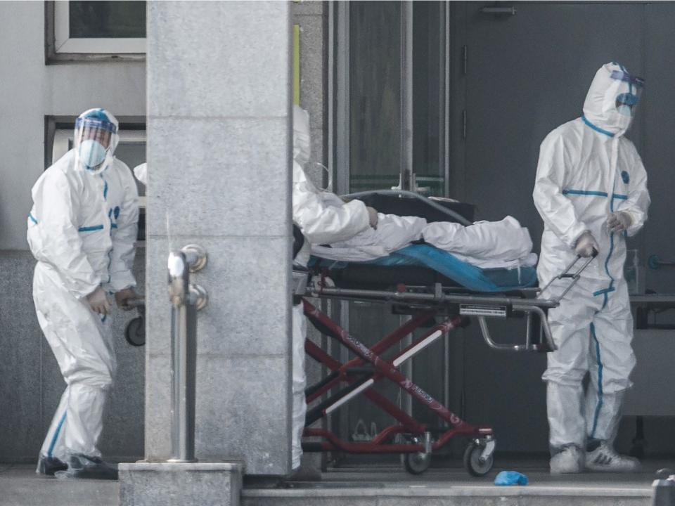 patients being carried out at hospital in Wuhan