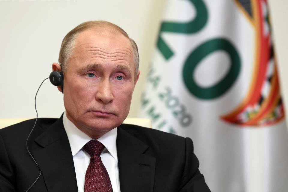 Russian President Vladimir Putin attends the G20 summit hosted by Saudi Arabia via video conference at the Novo-Ogaryovo residence outside Moscow, Russia, Saturday, Nov. 21, 2020. (Alexei Nikolsky, Sputnik, Kremlin Pool Photo via AP)