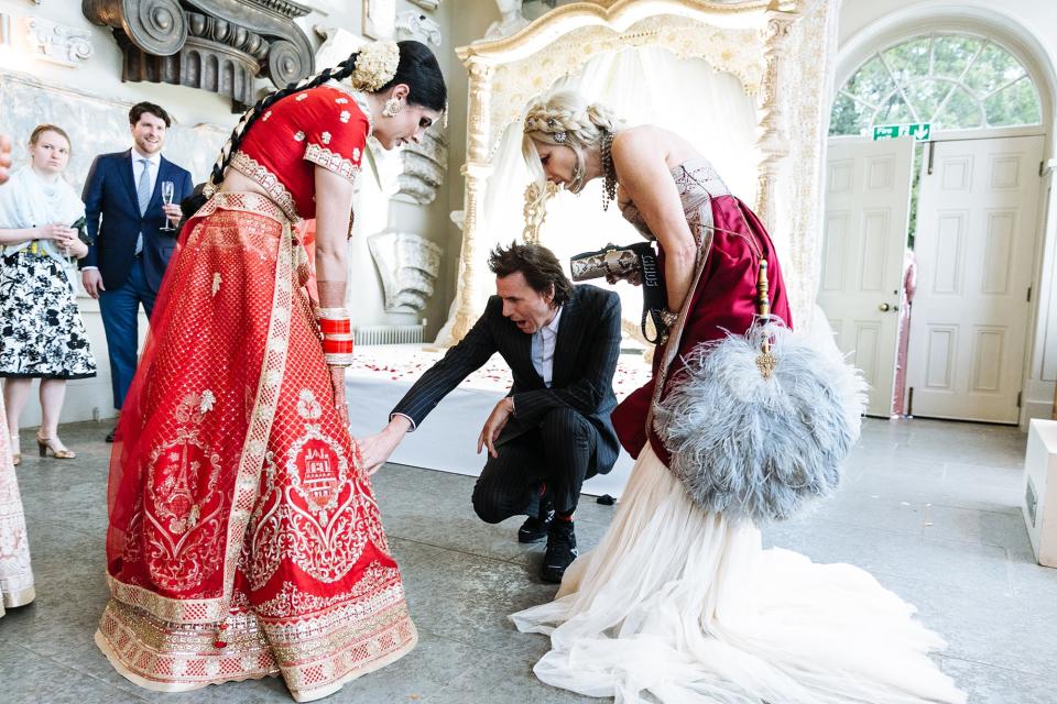 Our friends John and Gela getting up close and personal with the details of my lehenga. I definitely appreciated Gela’s amazing fan on the dance floor later that evening!