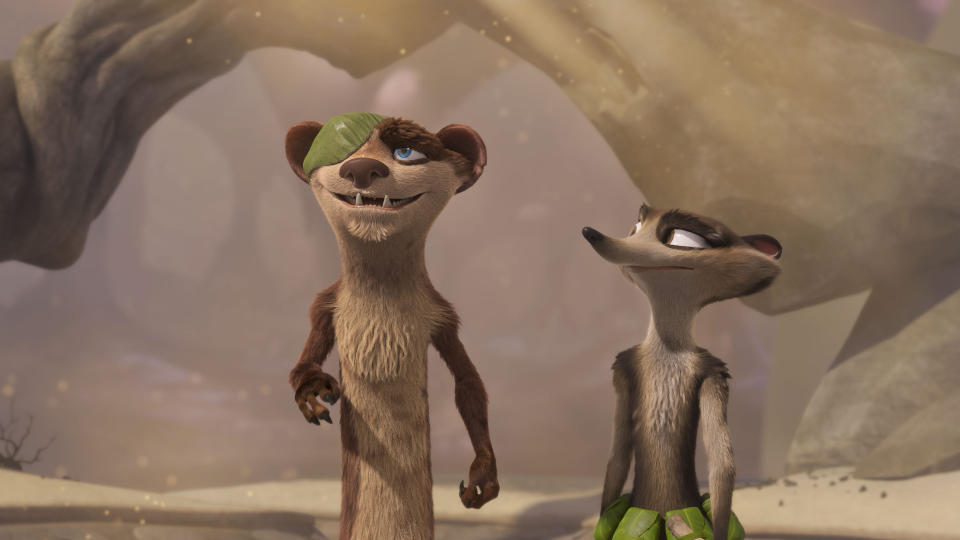This image released by Disney Enterprises shows Buck, voiced by Simon Pegg, left, and Zee, voiced by Justina Machado, in a scene from the animated feature "The Ice Age Adventures of Buck Wild." (Disney Enterprises via AP)