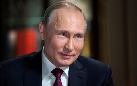 Russian President Vladimir Putin was seen as retaliating to the Magnitsky Act by blocking adoption of Russian children by parents in the United States - Credit: Reuters