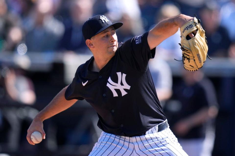 New York Yankees relief pitcher Cody Poteet (72) throws during the fifth inning of a spring training baseball game against the Minnesota Twins Monday, Feb. 26, 2024, in Tampa, Fla. (AP Photo/Charlie Neibergall)