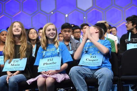 May 31, 2017; National Harbor, MD, USA; Casper Smith (NC), right, spelled the word plesiobiosis (the association of insect colonies) correctly during the 2017 Scripps National Spelling Bee at the Gaylord National Resort and Convention Center. Mandatory Credit: Jack Gruber-USA TODAY NETWORK