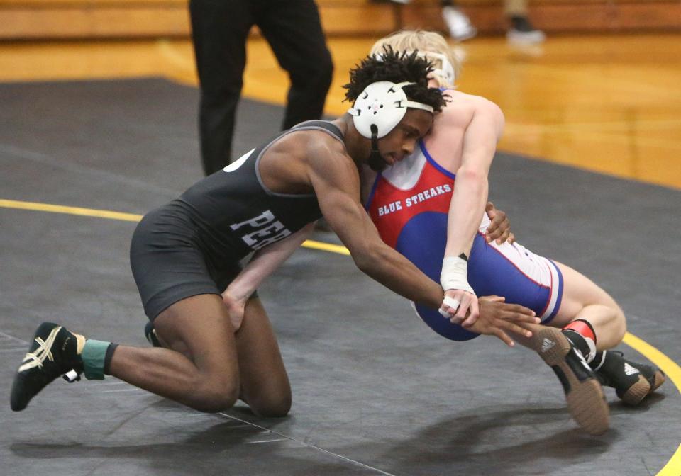 Charles Curtis, left, of Perry defeated Gavin Greathouse, right, of Lake in a 126 pound bout at Perry on Thursday, Jan. 20, 2022. 