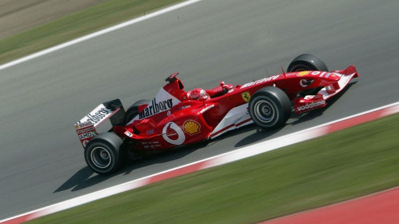 A photo of Michael Schumacher in his 2003 Ferrari f1 car. 