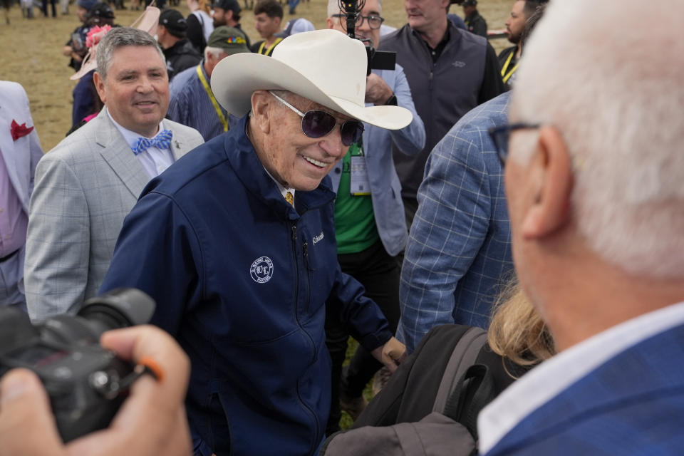 Seize The Grey's trainer D. Wayne Lukas, center, reacts after his horse won the Preakness Stakes horse race at Pimlico Race Course, Saturday, May 18, 2024, in Baltimore. (AP Photo/Julia Nikhinson)