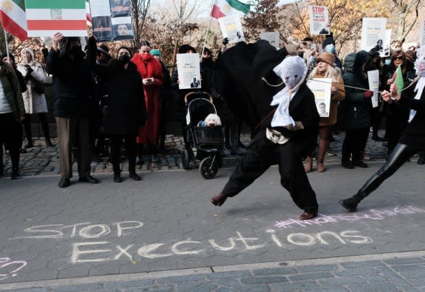 In New York City in December, people demonstrated outside the Iranian diplomat's residence. <p>Photo: Spencer Platt/Getty Images</p>