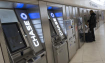 FILE - Chase Bank ATMs are shown, Thursday, March 25, 2021, in New York. As many Americans celebrate Memorial Day on Monday, May 27, 2024, there are several stores, government offices and businesses that will be open or closed. (AP Photo/Mark Lennihan, File)