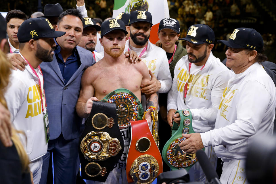 Canelo Alvarez, of Mexico, poses after his win against Daniel Jacobs in a middleweight title boxing match Saturday, May 4, 2019, in Las Vegas. (AP Photo/John Locher)