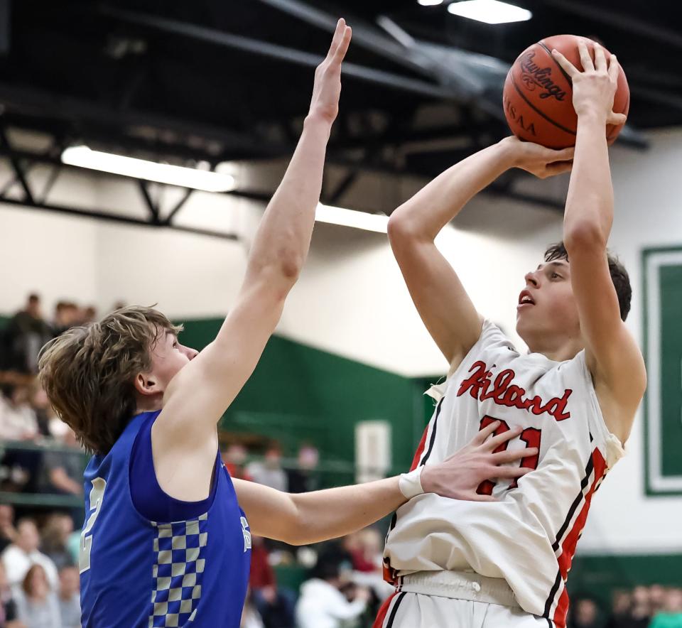 HIland's Carson Habeger fires up this second half shot against Bishop Ready.