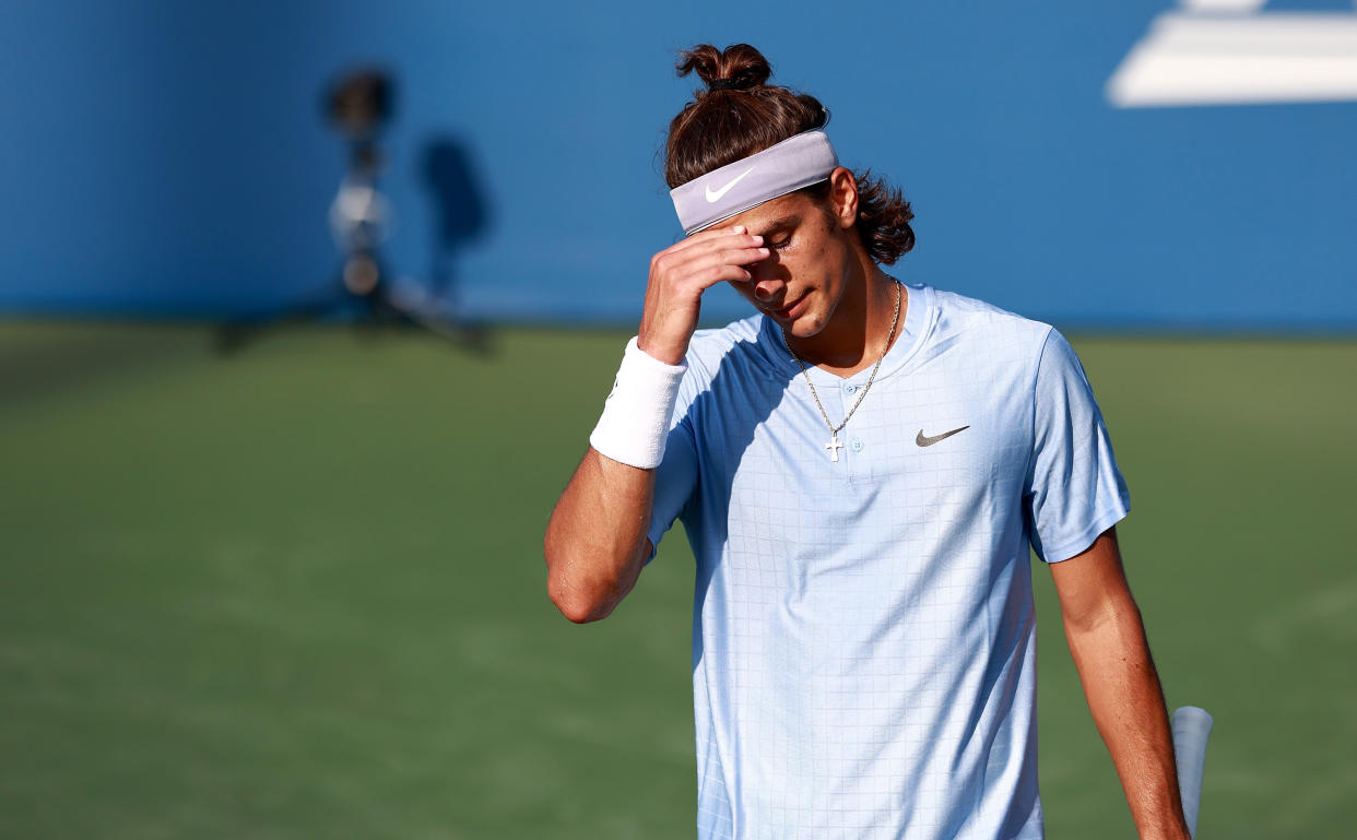 WINSTON SALEM, NORTH CAROLINA - AUGUST 23: Lorenzo Musetti of Italy reacts to a missed shot during his loss to Federico Coria of Argentina on Day 3 of the Winston-Salem Open at Wake Forest Tennis Complex on August 23, 2021 in Winston Salem, North Carolina. (Photo by Grant Halverson/Getty Images)