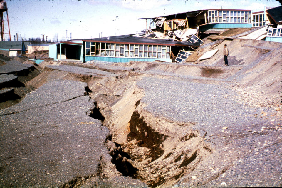 In this March 1964 photo released by the U.S. Geological Survey, the Government Hill Elementary School is shown destroyed by a landslide following an earthquake in Anchorage, Alaska. North America's largest earthquake rattled Alaska 50 years ago, killing 15 people and creating a tsunami that killed 124 more from Alaska to California. The magnitude 9.2 quake hit at 5:30 p.m. on Good Friday, turning soil beneath parts of Anchorage into jelly and collapsing buildings that were not engineered to withstand the force of colliding continental plates. (AP Photo/U.S. Geological Survey)