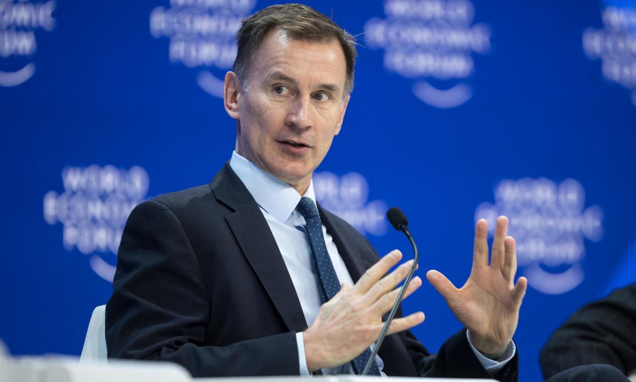 <span>Jeremy Hunt at the World Economic Forum meeting in Davos in January.</span><span>Photograph: Fabrice Coffrini/AFP/Getty</span>