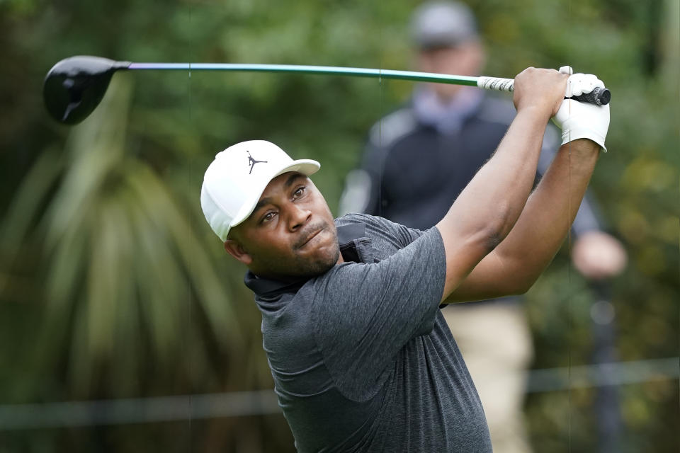 Harold Varner III hits from the 13th tee during the first round of play in The Players Championship golf tournamnet Thursday, March 10, 2022, in Ponte Vedra Beach, Fla. (AP Photo/Gerald Herbert)