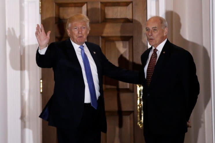 Donald Trump appears with John Kelly at Trump National Golf Club in Bedminster, N.J., after a meeting last month. (Photo: Mike Segar/Reuters)