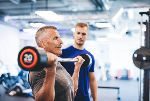 <span class="caption">Weightlifting isn't as intimidating as it might look.</span> <span class="attribution"><a class="link " href="https://www.shutterstock.com/image-photo/older-man-lifting-weights-supervised-by-1174033153" rel="nofollow noopener" target="_blank" data-ylk="slk:PHOTOCREO Michal Bednarek/ Shutterstock;elm:context_link;itc:0;sec:content-canvas">PHOTOCREO Michal Bednarek/ Shutterstock</a></span>