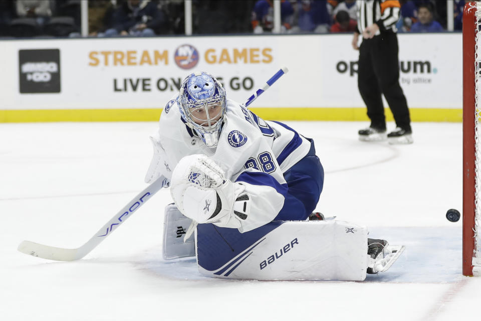 Tampa Bay Lightning goaltender Andrei Vasilevskiy (88) watches a puck shot past him for a goal by New York Islanders' Ryan Pulock during the second period of an NHL hockey game Friday, Nov. 1, 2019, in Uniondale, N.Y. (AP Photo/Frank Franklin II)