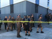 <p>UPS workers gather outside after a reported shooting at a UPS warehouse and customer service center in San Francisco on Wednesday, June 14, 2017. (AP Photo/Eric Risberg) </p>