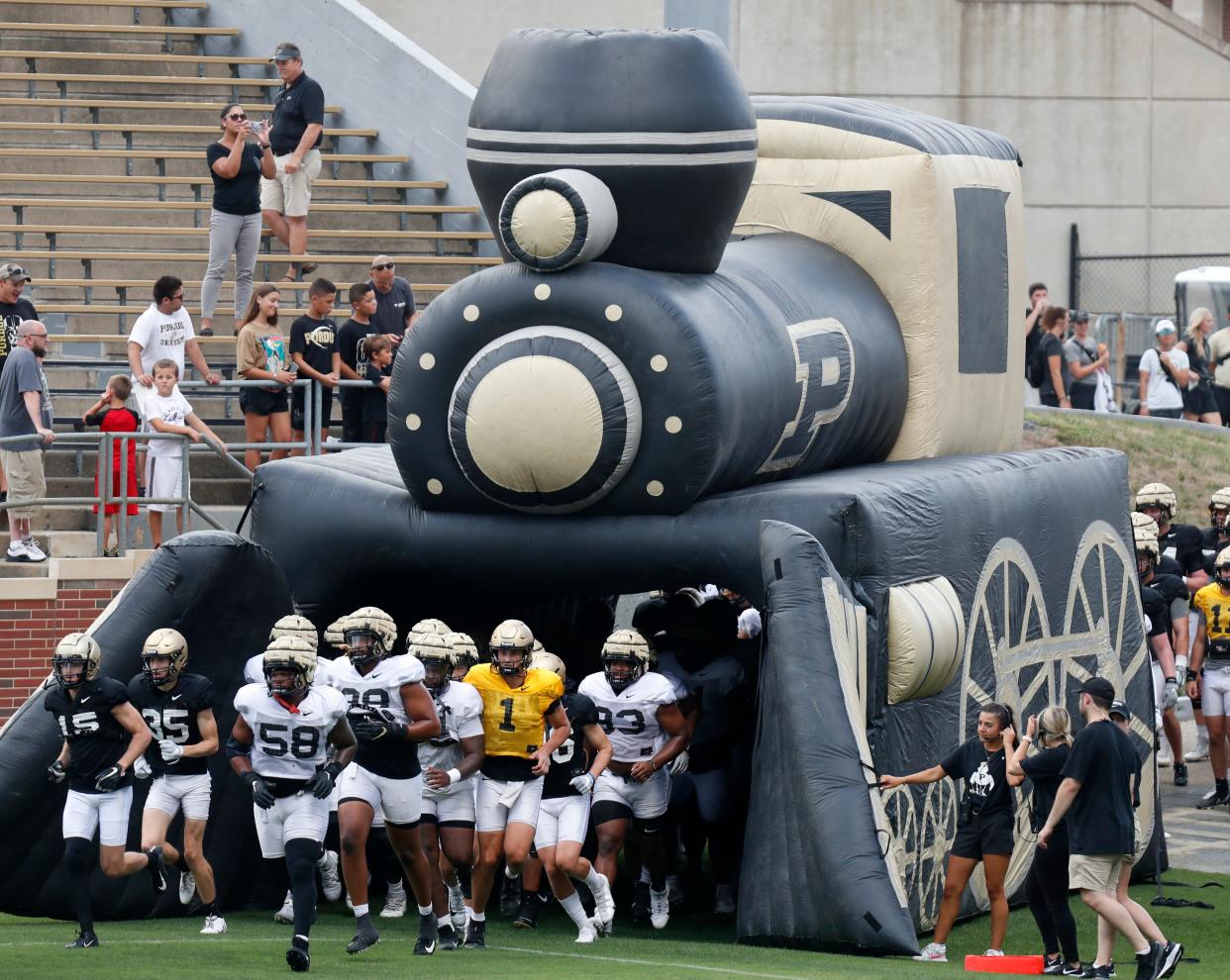 Purdue Boilermakers take to the field during a practice, Friday, Aug. 5, 2022, at Ross-Ade Stadium in West Lafayette, Ind. 