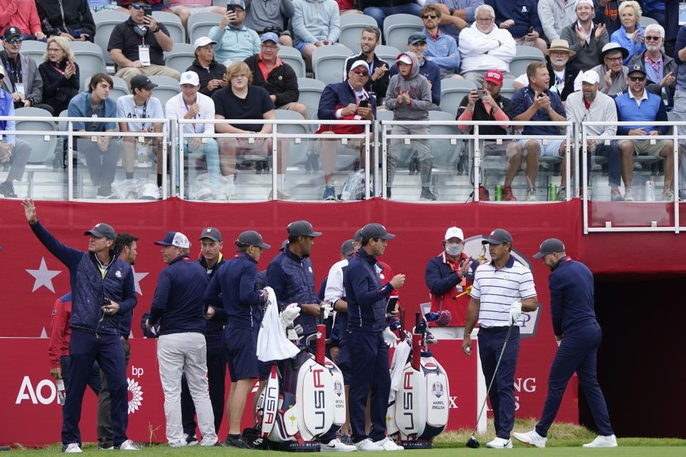 Team USA players wait to tee off on the first hole during a practice day at the Ryder Cup at the Whistling Straits Golf Course Tuesday, Sept. 21, 2021, in Sheboygan, Wis. (AP Photo/Charlie Neibergall)
