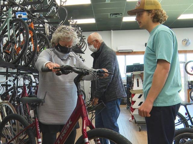 Betty Anne Younker says the $100 rebate she received on the purchase of her new bike helped pay for extras like a kick stand, racks and mirror. (Brian Higgins/CBC - image credit)