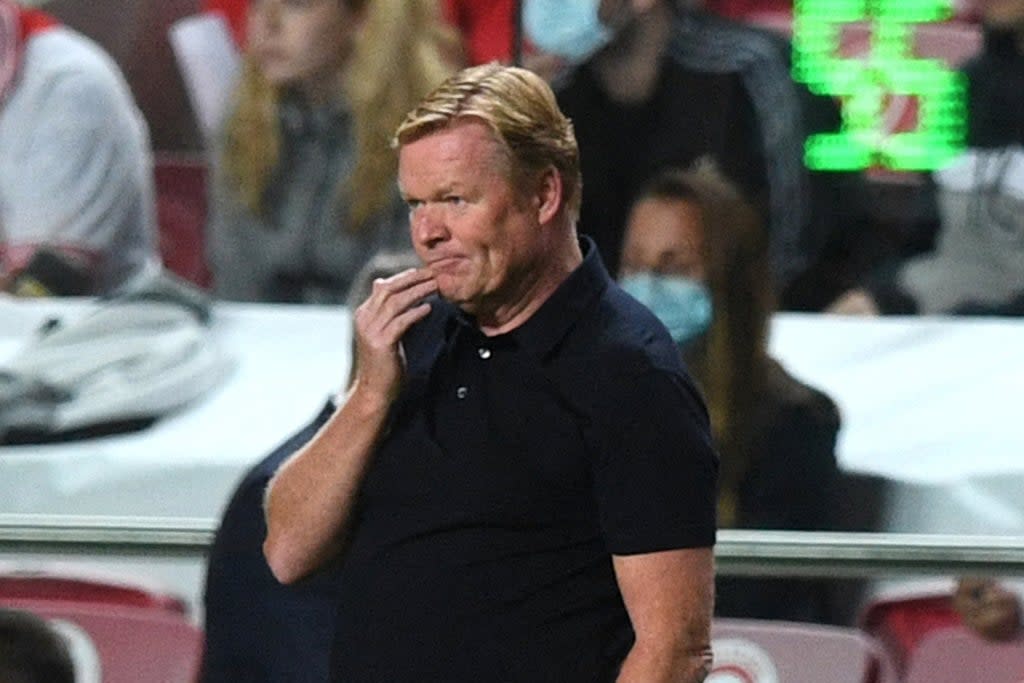 Ronald Koeman may be on the brink at Barcelona after a 3-0 loss against Benfica  (AFP via Getty Images)