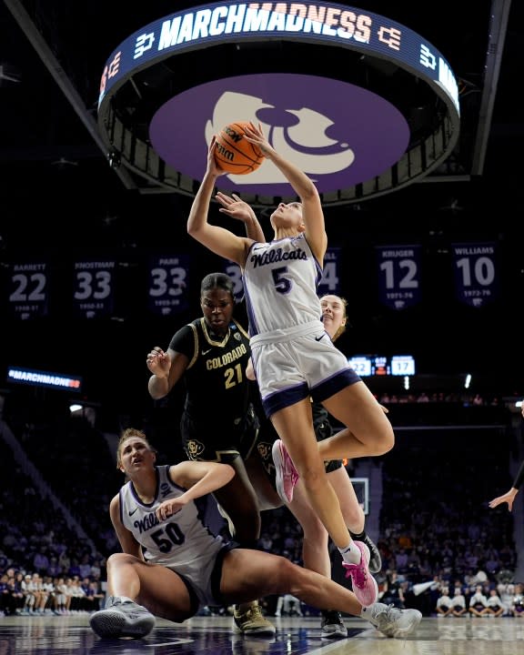 Kansas State guard Brylee Glenn (5) puts up a shot during the first half of a second-round college basketball game against Colorado in the women’s NCAA Tournament in Manhattan, Kan., Sunday, March 24, 2024, in Manhattan, Kan. (AP Photo/Charlie Riedel)