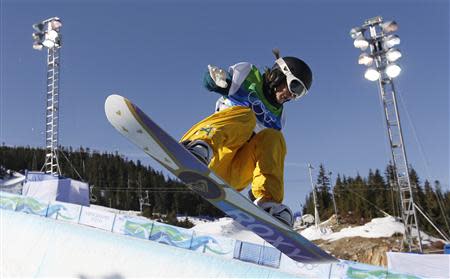 Gold medalist Torah Bright, of Australia, competes during the women's halfpipe qualifying on Cypress Mountain at the Vancouver 2010 Winter Olympics, in this file photo from February 18, 2010. REUTERS/Mark Blinch