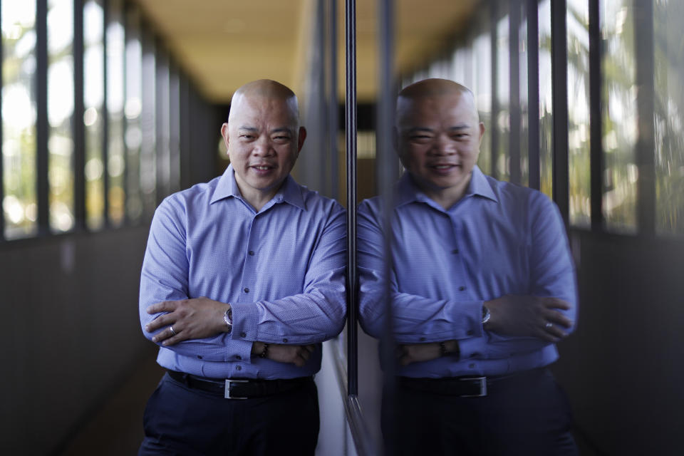 Sonny Vinuya poses for a portrait Tuesday, July 7, 2020, in Las Vegas. Vinuya, a Filipino-American businessman in Las Vegas, hasn't decided if he'll vote again for Donald Trump in the battleground state of Nevada. (AP Photo/John Locher)