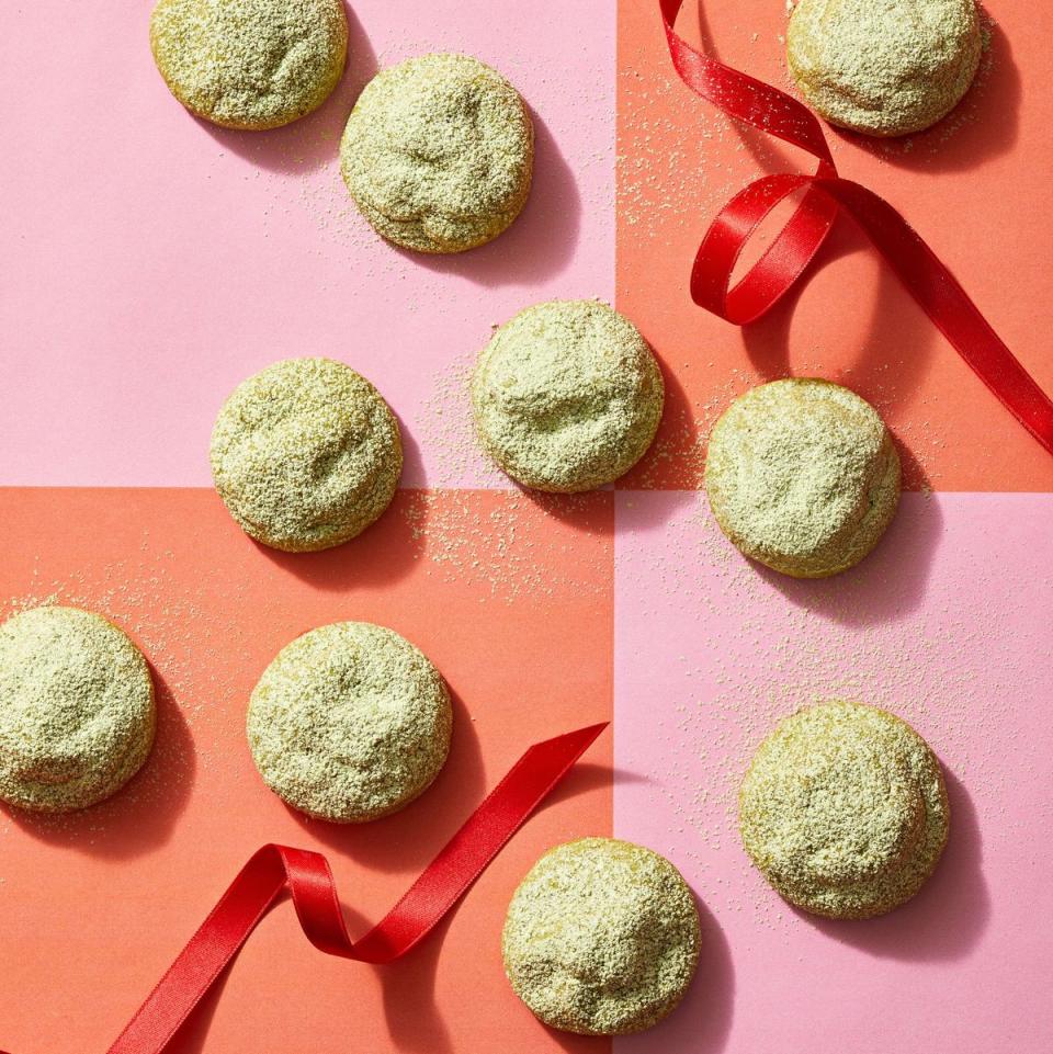 snowball cookies with matcha powder dusted on top