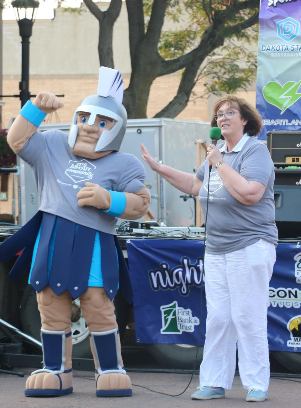 President José-Marie Griffiths (right) introduces General Cyber, Dakota State University's new mascot, to the Madison community Aug. 17.
