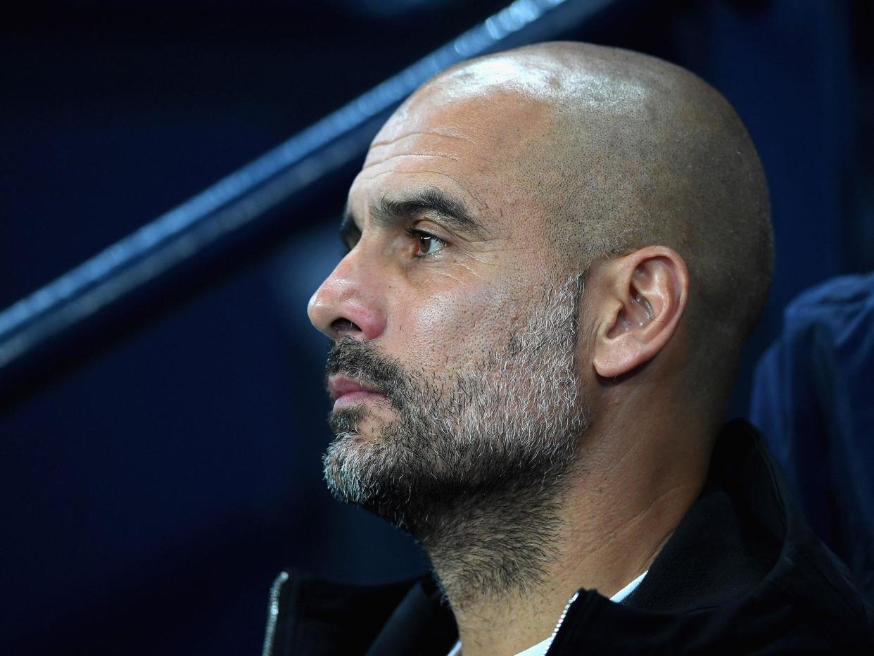 Pep Guardiola has played down early title talk surrounding his side: Getty