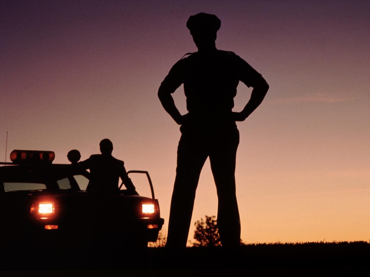 silhouette of police officer