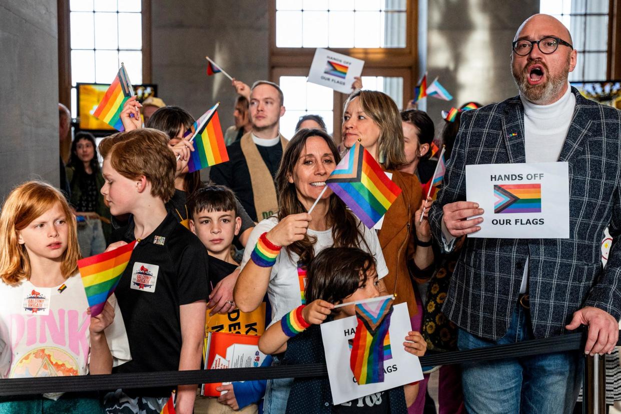 <span>People protest the pride flag ban bill at the capitol in Nashville, Tennessee, on 26 February 2024. </span><span>Photograph: Seth Herald/Reuters</span>