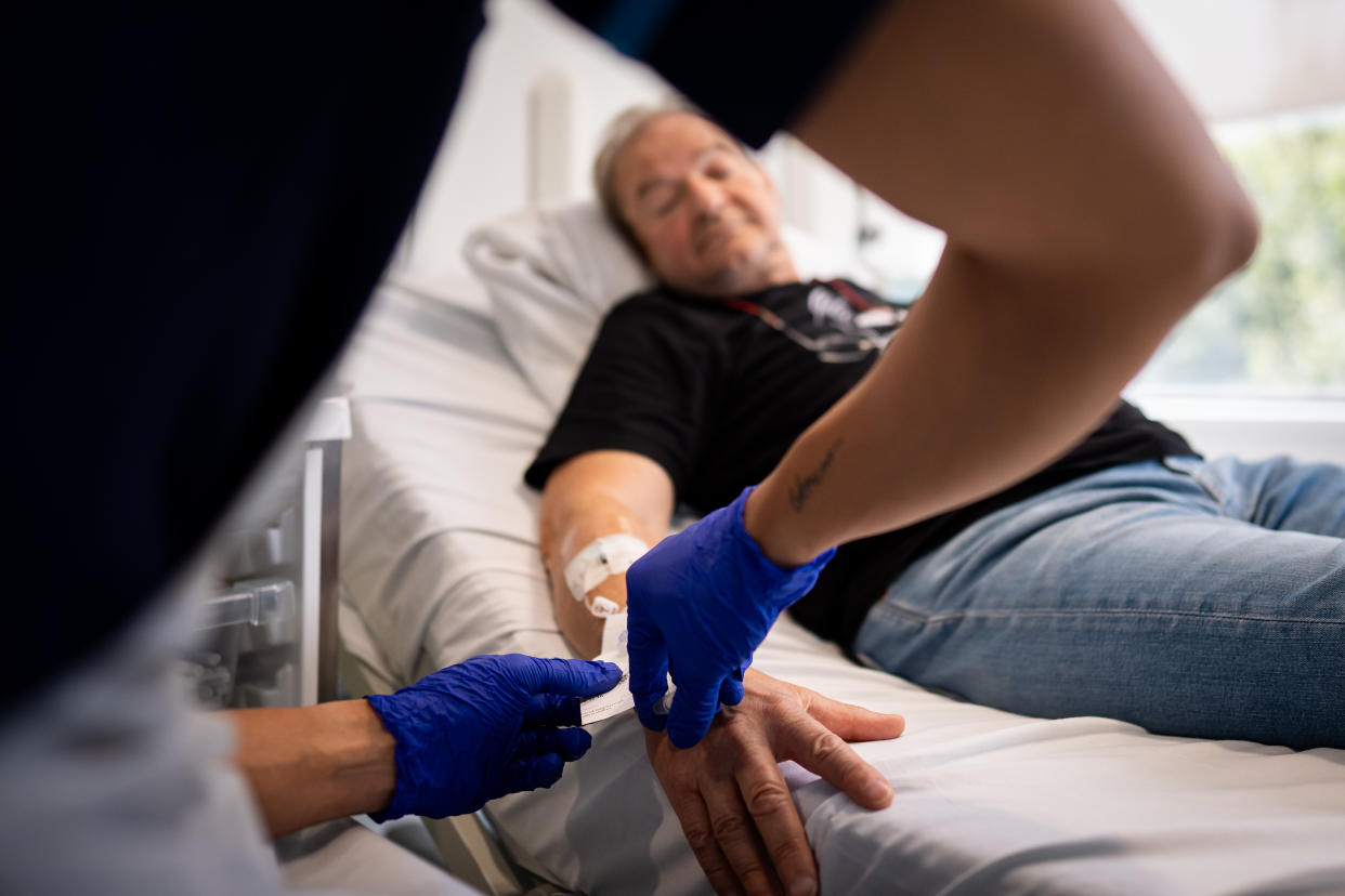 Janusz Racz receiving a dose of the BNT116 vaccine (Aaron Chown/PA)