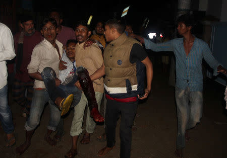 A wounded man is taken to a hospital by local people after a bomb blast in Sylhet, Bangladesh, March 25, 2017. REUTERS/Stringer FOR EDITORIAL USE ONLY. NO RESALES. NO ARCHIVES