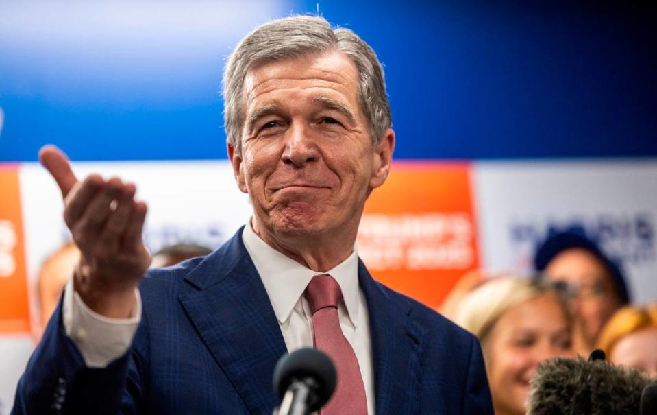 Gov. Roy Cooper answers questions from reporters during a Harris campaign event in Raleigh on Thursday, July 25, 2024. Cooper is on Vice President Kamala Harris’ short list of potential running mates.