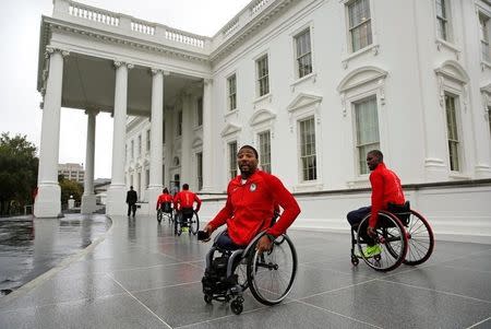 Members of U.S. Paralympics team arrive to be greeted by President Barack Obama at the White House in Washington, U.S., September 29, 2016. REUTERS/Yuri Gripas