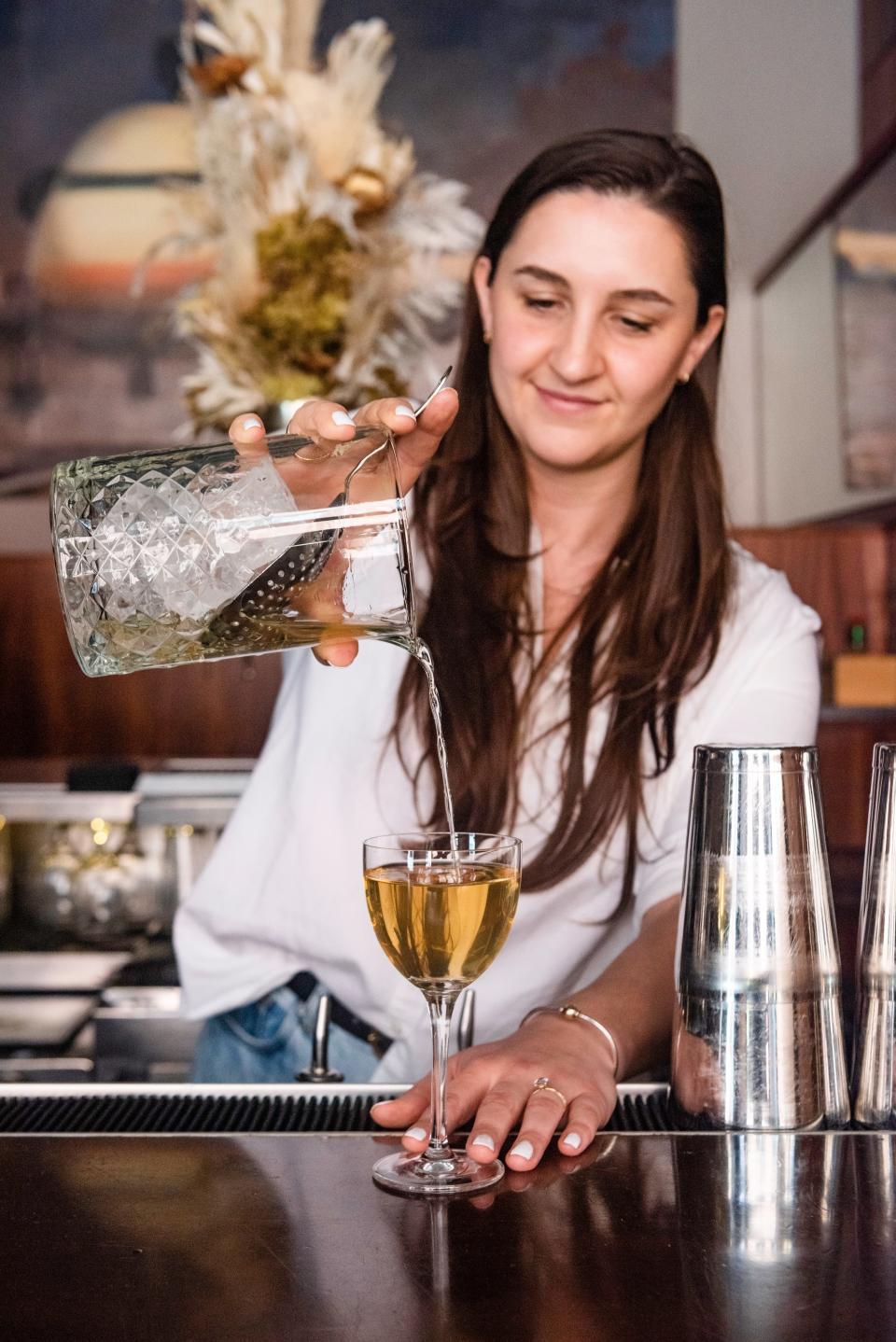 Keep an eye on Eddy bartender Britt Simons. Here she serves her Crushed Velvet made with orchard fruit-infused gin.