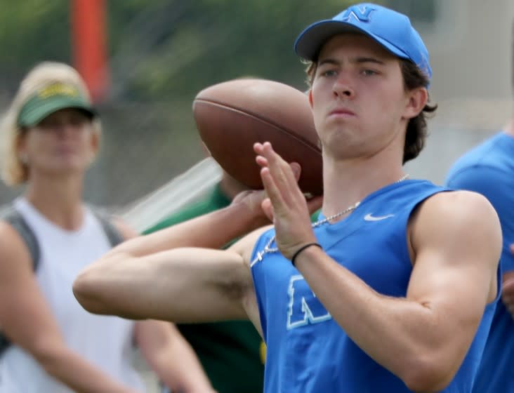 HUNTINGTON BEACH, CALIF. - JULY 3, 2021. Norco quarterback Kyle Crum competes in a seven-on-seven competition at Edison High School in Huntington Beach on Saturday, July 3, 2021. (Luis Sinco / Los Angeles Times)