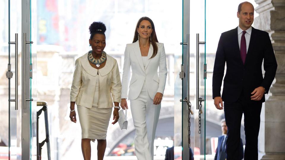 Prince William, Duke of Cambridge and Catherine, Duchess of Cambridge accompanied by Baroness Floella Benjamin attend the unveiling of the National Windrush Monument at Waterloo Station