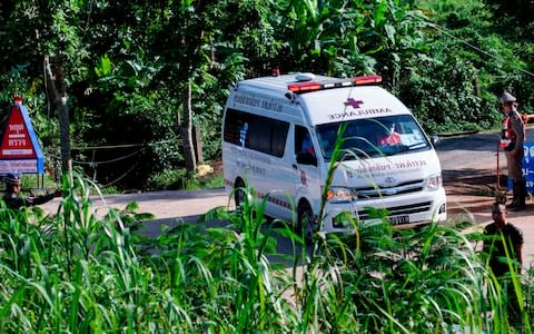An ambulance exits from the Tham Luang cave - Credit: YE AUNG THU /AFP