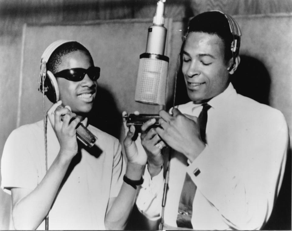 Stevie Wonder and Marvin Gaye around a microphone at the Motown recording studio in Detroit in 1965