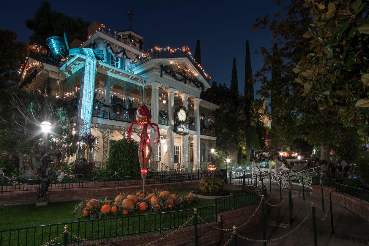 From Halloween Time through the holiday season, Haunted Mansion Holiday at Disneyland Park features a merry makeover of the beloved eerie estate. Jack Skellington is behind the mayhem, decorating the mansion with frightfully festive touches inspired by Tim Burton's The Nightmare Before Christmas. Dedicated fans of the holiday house will look forward to spotting the annual bespoke gingerbread house on its precarious perch on the ballroom table. Other favourite sights await, including characters from the movie Sally, Zero and other Nightmare nasties on hand. (Joshua Sudock/Disneyland Resort)