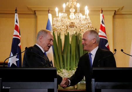 Israeli Prime Minister Benjamin Netanyahu (L) and Australian Prime Minister Malcolm Turnbull shake hands during their joint news conference at Kirribilli House in Sydney, Australia, February 22, 2017. REUTERS/Jason Reed
