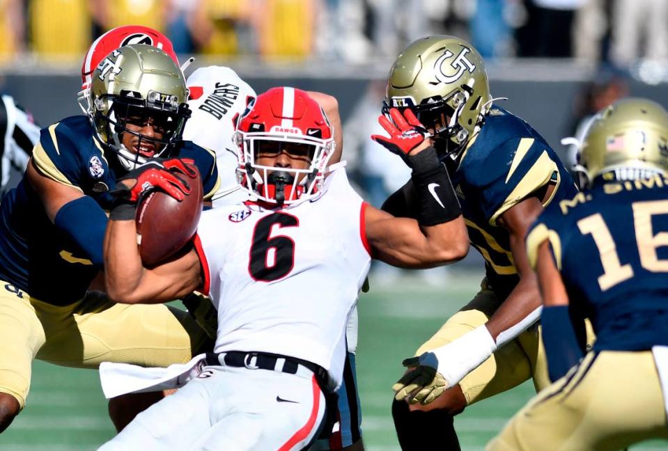 Georgia running back Kenny McIntosh (6) is knocked out of bounds in the first half of the Bulldogs 45-0 win over Georgia Tech Saturday in Atlanta.