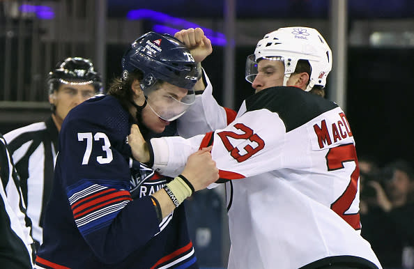 NEW YORK, NEW YORK – APRIL 03: Kurtis MacDermid #23 of the New Jersey Devils fights with Matt Rempe #73 of the New York Rangers during the first period at Madison Square Garden on April 03, 2024 in New York City. (Photo by Bruce Bennett/Getty Images)