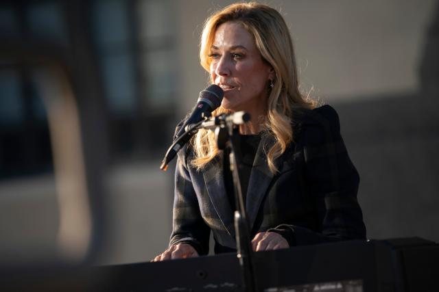 Sheryl Crow performs during the Nashville Remembers candlelight vigil to mourn and honor the victims of The Covenant School mass shooting at Public Square Park in Nashville, Tenn. on March 29, 2023.